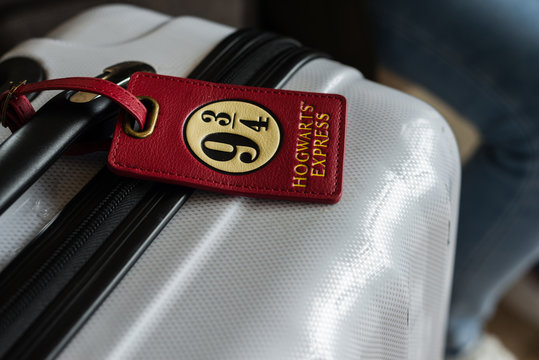 luggage with harry potter tag