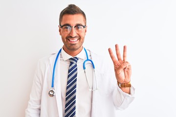 Young handsome doctor man wearing stethoscope over isolated background showing and pointing up with fingers number three while smiling confident and happy.