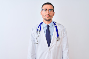 Young doctor man wearing stethoscope over isolated background skeptic and nervous, frowning upset because of problem. Negative person.