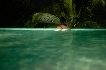 A luxury infinity pool in a tropical resort