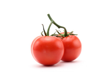 Red tomatoes on white background