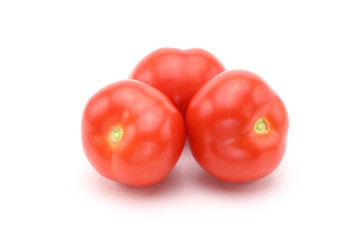 Red tomatoes on white background
