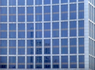 Windows of a multistory building. Abstract urban background
