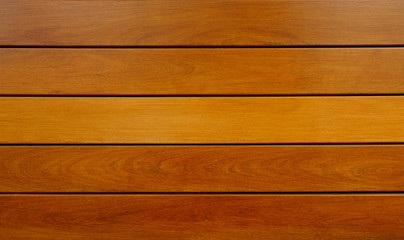 Elegant varnished wooden iroko planks.