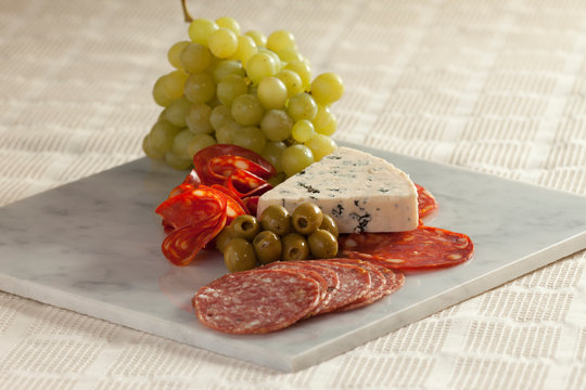 Carnes fr&iacute;as y queso azul