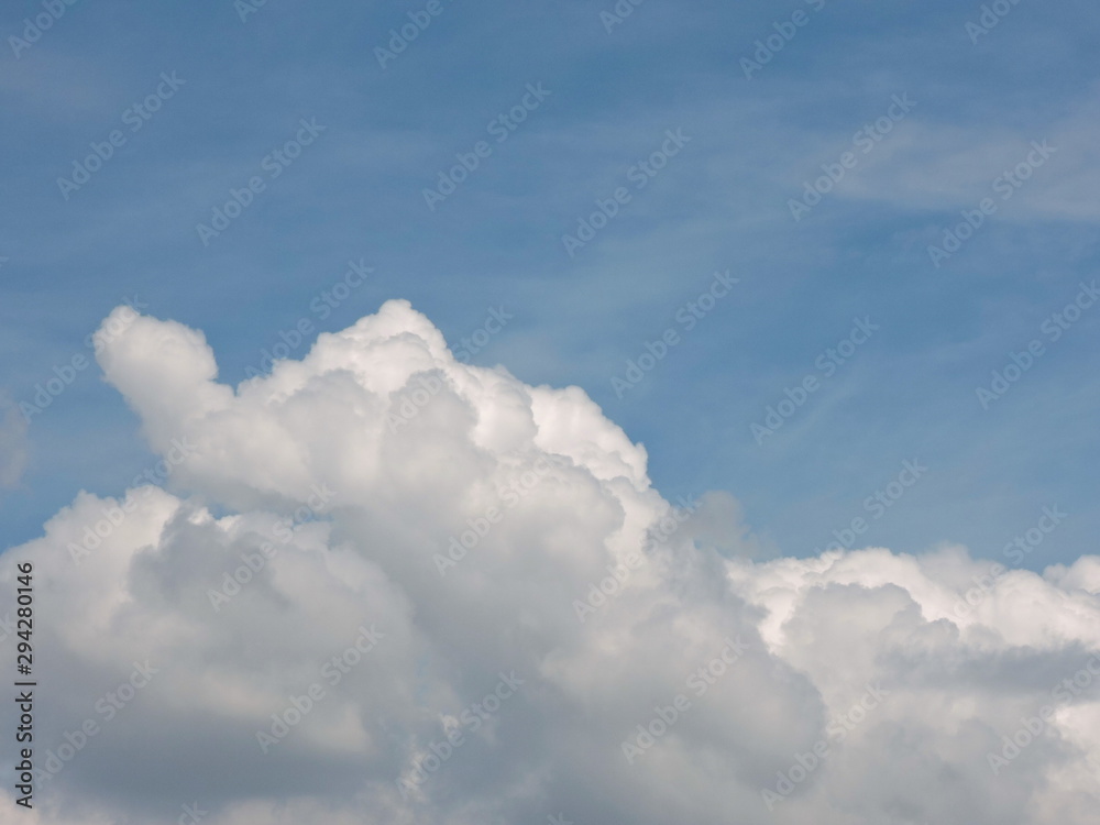 Wall mural blue sky background with clouds