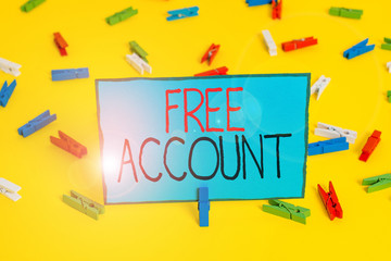 Text sign showing Free Account. Business photo showcasing signing up demonstratingal information or log in identity in a server Colored clothespin papers empty reminder yellow floor background office