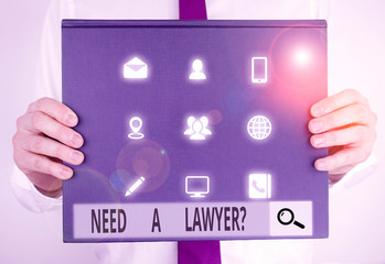 Text sign showing Need A Lawyer Question. Business photo text Legal problem Looking for help from an attorney Male human holding thick textured cardboard of business promotion concept