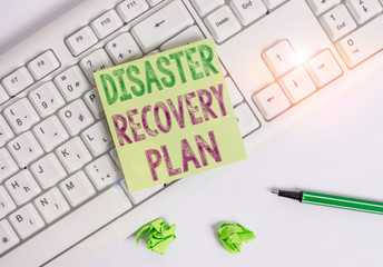 Writing note showing Disaster Recovery Plan. Business concept for having backup measures against...