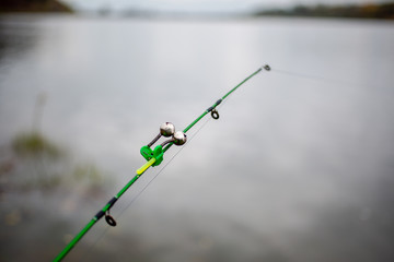a light and sound signal is installed on the fishing rod to determine the bite in the dark