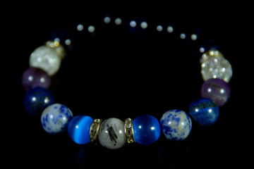blue and white tone Lucky stone bracelet Beads with background 