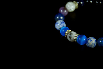 blue and white tone Lucky stone bracelet Beads with background 