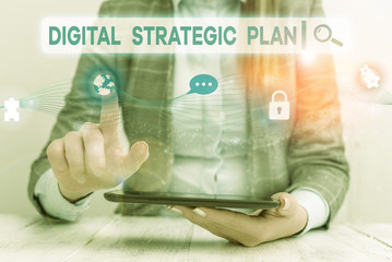 Text sign showing Digital Strategic Plan. Business photo showcasing creat schedule for marketing product or brand Female human wear formal work suit presenting presentation use smart device