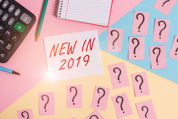 Word writing text New In 2019. Business photo showcasing what will be expecting or new creation for the year 2019 Mathematics stuff and writing equipment above pastel colours background