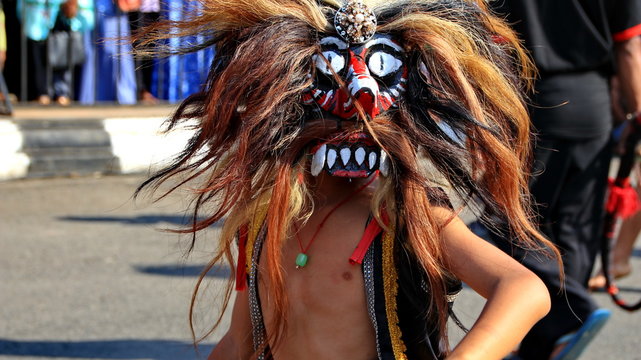  Pekalongan,Central Java/Indonesia - 6 October April 2019 : participants parade in puppet costumes while in action, Reog Ponorogo player