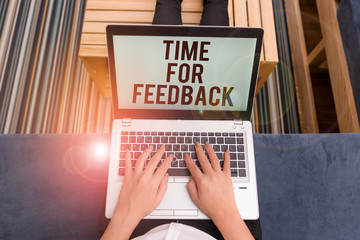 Writing note showing Time For Feedback. Business concept for information about reactions to a product or services woman laptop computer office supplies technological devices inside home