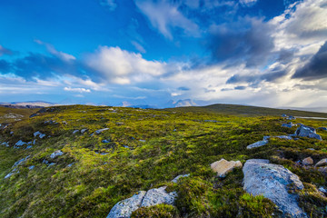 Fototapeta premium Beautiful scenic landscape of Scotland nature with beautiful evening sun set sky.