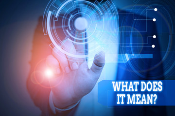 Text sign showing What Does It Mean Question. Business photo text Give me the meaning of something Definition Male human wear formal work suit presenting presentation using smart device
