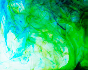 Food color drop and dissolve in water for abstract and background.