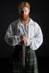 Historical, Red-haired Scotsman with a sword 