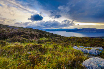Beautiful scenic landscape of Scotland nature with beautiful evening sun set sky.
