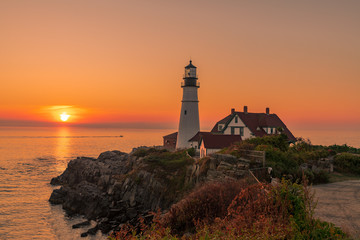Fototapeta na wymiar Magical sunrise at the iconic Portland Head Light. Portland, Maine
