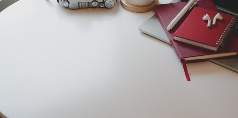 Cropped shot of contemporary workplace with copy space and office supplies