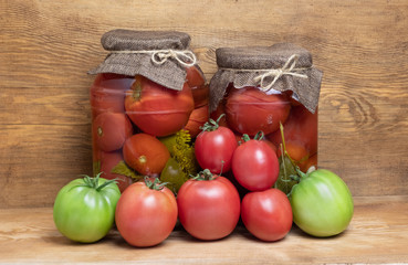  Jars with pickled vegetables isolated on white 