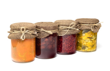  Jars with pickled vegetables isolated on white 