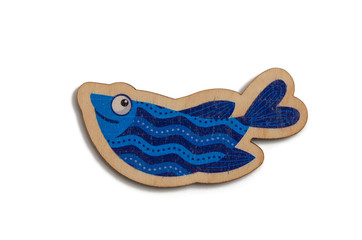 wooden toy blue fish on a white background isolated
