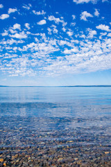 Yellowstone lake under white clouds in Wyoming