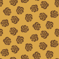 A seamless vector pattern with textured vrown roses on a mustard yellow background. Surface print design.