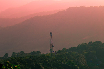 Obraz premium Wide natural background blurred by the bright sunlight above the mountains during the reversal of the horizon, beautiful twilight light, cold wind blowing through, fresh air