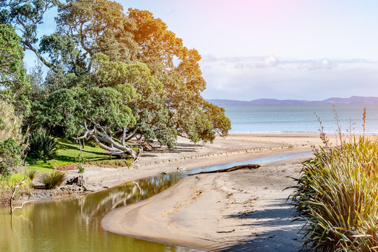 A beautiful photo of a river mouth flowing into the sea