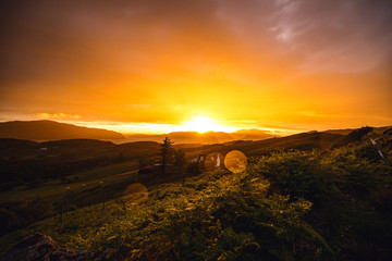 Beautiful scenic landscape of Scotland nature with beautiful evening sun set sky.