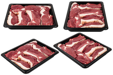 Pieces of fresh raw meat packed in plastic packaging. Ready for sale. White isolated.