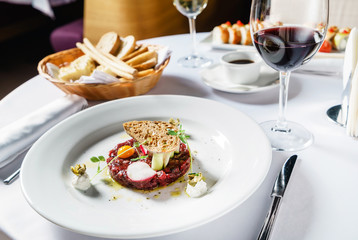 beef tartare with egg and wine