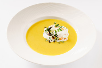 vegetable cream soup on white