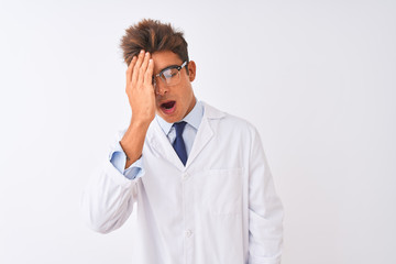 Young handsome sciencist man wearing glasses and coat over isolated white background Yawning tired covering half face, eye and mouth with hand. Face hurts in pain.