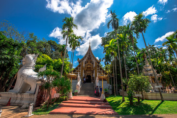 background,Open view of the temple at Dara Pirom Temple (Mae Rim),which has a large statue in front of the temple. Covered by trees and sky, Chiang Mai Province, Thailand, Wat Pa Daphirom