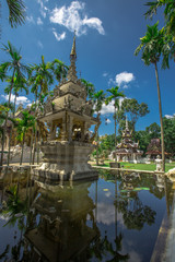 Fototapeta premium background,Open view of the temple at Dara Pirom Temple (Mae Rim),which has a large statue in front of the temple. Covered by trees and sky, Chiang Mai Province, Thailand, Wat Pa Daphirom