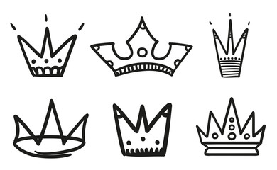 Monochrome crowns on isolated white. Hand drawn simple objects. Line art. Black and white illustration