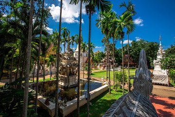 Fototapeta premium background,Open view of the temple at Dara Pirom Temple (Mae Rim),which has a large statue in front of the temple. Covered by trees and sky, Chiang Mai Province, Thailand, Wat Pa Daphirom
