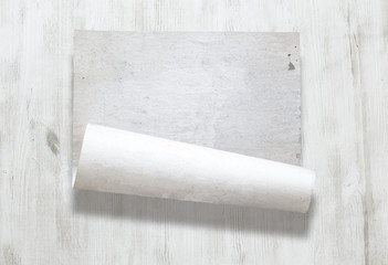 paper on wooden background