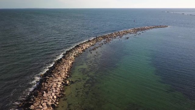 Aerial view of sea wall protecting the Point Judith Harbor of Refuge from storms and bad weather