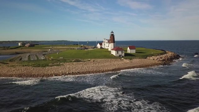 Aerial orbit of Point Judith Lighthouse on the coast near Narragansett in Rhode Island