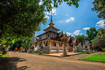 background,Open view of the temple at Dara Pirom Temple (Mae Rim),which has a large statue in front of the temple. Covered by trees and sky, Chiang Mai Province, Thailand, Wat Pa Daphirom