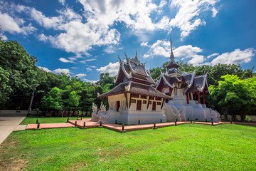 Fototapeta premium background,Open view of the temple at Dara Pirom Temple (Mae Rim),which has a large statue in front of the temple. Covered by trees and sky, Chiang Mai Province, Thailand, Wat Pa Daphirom