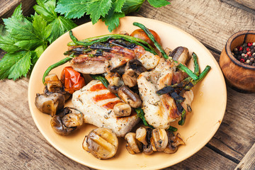 Grilled meat on rustic wooden table