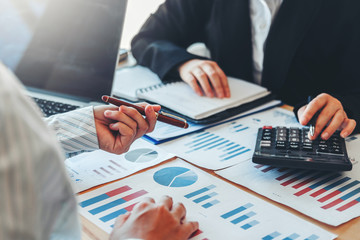 Business team meeting Strategy Planning with new startup project plan Finance and Economy Graph with laptop successful teamwork